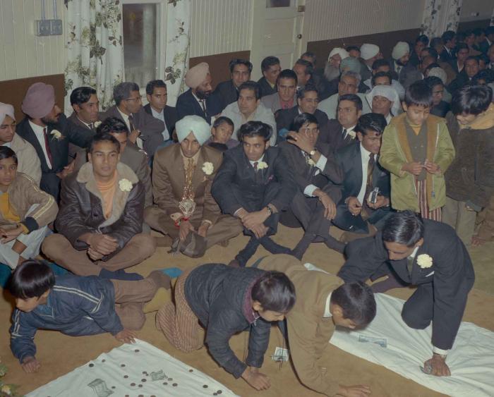 [Photo of the wedding attendees]