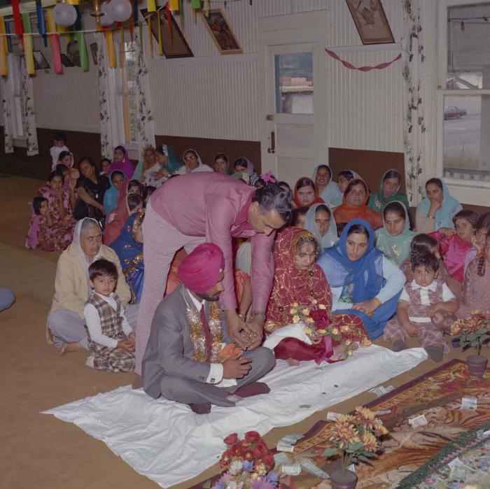 [Photo of Nirmal Singh Sivia and Baljinder Kaur Gill]