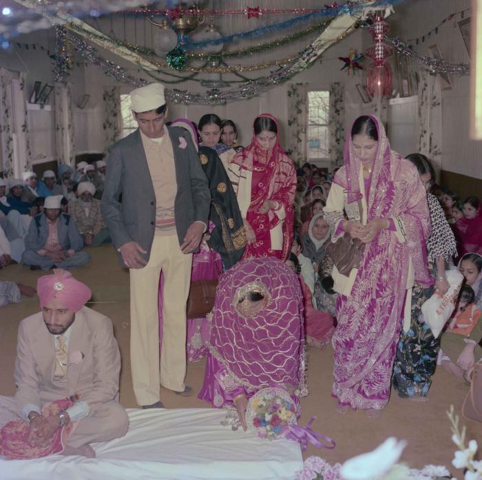 [Photo of Biker Singh Saran and Malkit Kaur]