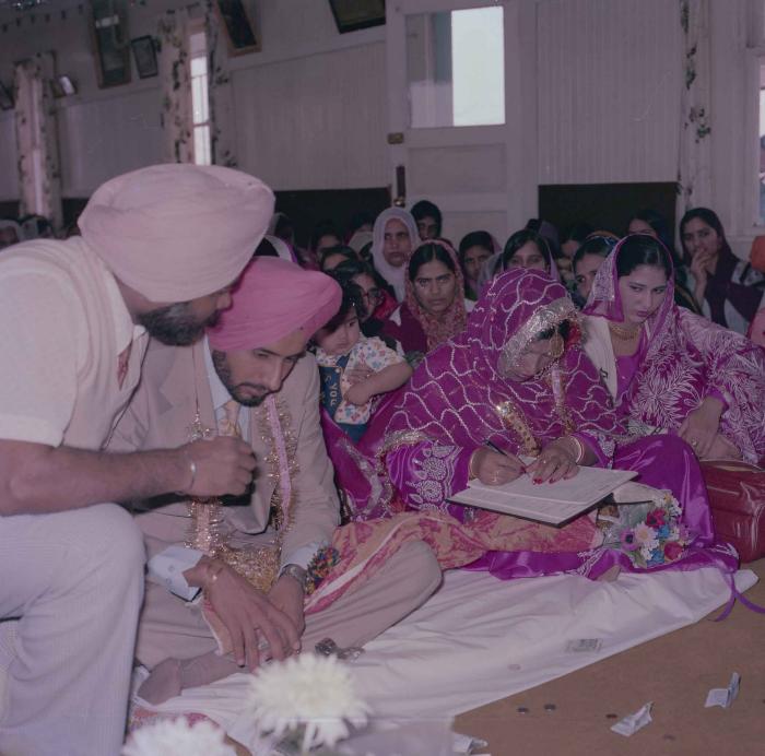 [Photo of Biker Singh Saran and Malkit Kaur]