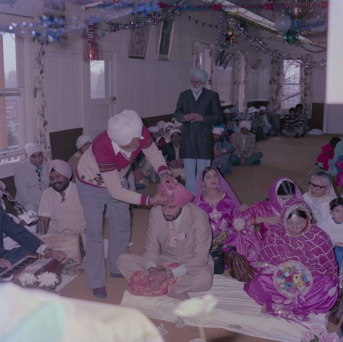 [Photo of Biker Singh Saran and Malkit Kaur]