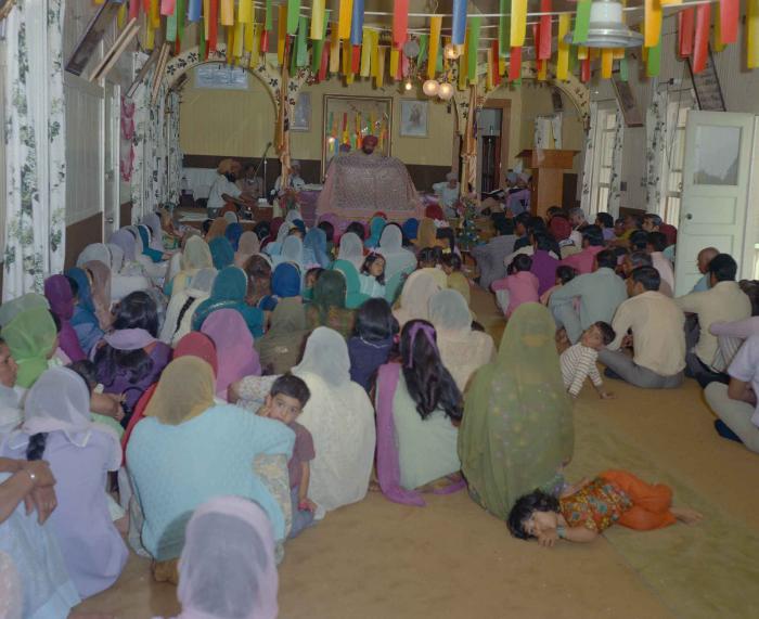 [Photo of Sri Guru Granth Sahib]
