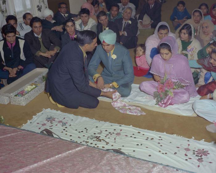 [Photo of Sukhdarshan Singh Gill with an unidentified bride]