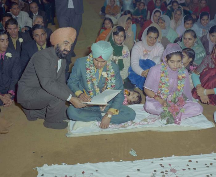 [Photo of Sukhdarshan Singh Gill with an unidentified bride]