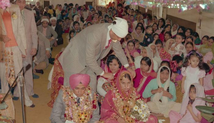 [Photo of Manjit Singh and Sukhdev Gill]