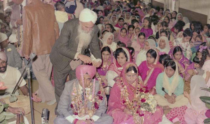 [Photo of Manjit Singh and Sukhdev Gill]