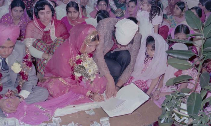 [Photo of Manjit Singh and Sukhdev Gill]