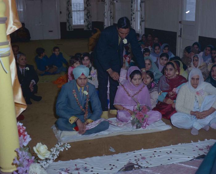 [Photo of Sukhdarshan Singh Gill with an unidentified bride]