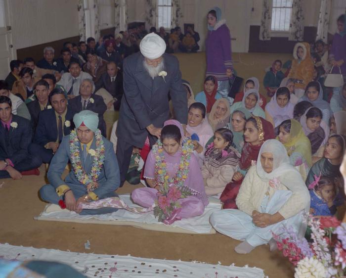 [Photo of Sukhdarshan Singh Gill with an unidentified bride]