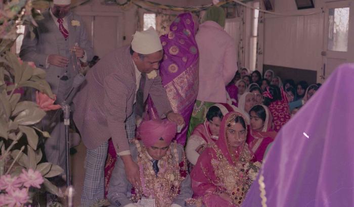 [Photo of Manjit Singh and Sukhdev Gill]
