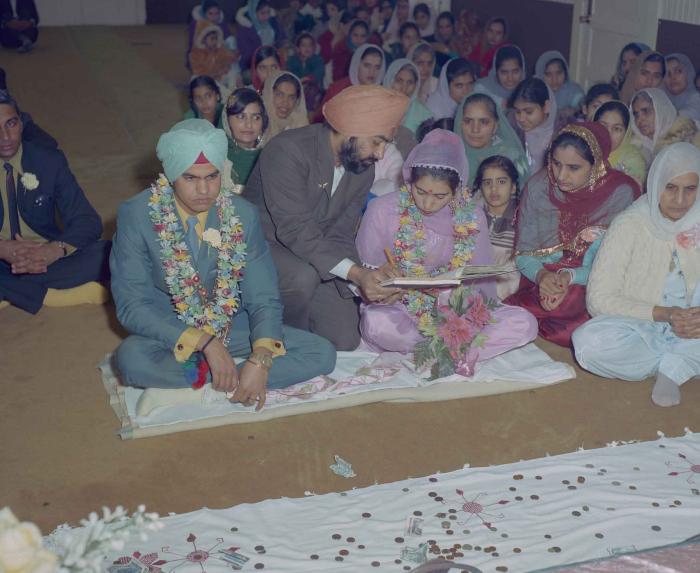 [Photo of Sukhdarshan Singh Gill with an unidentified bride]
