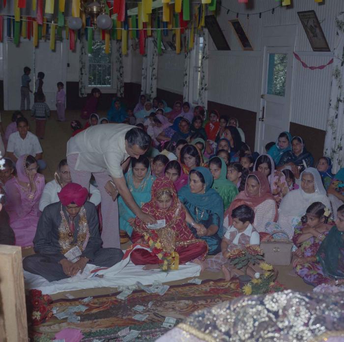 [Photo of Jagdeep Singh Sangha and Sukhdev Kaur Gill]