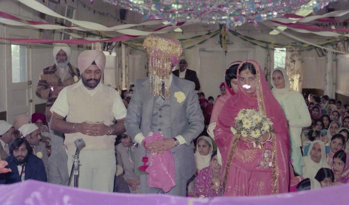 [Photo of Manjit Singh and Sukhdev Gill]
