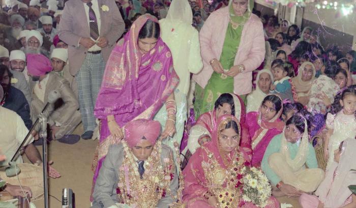 [Photo of Manjit Singh and Sukhdev Gill]