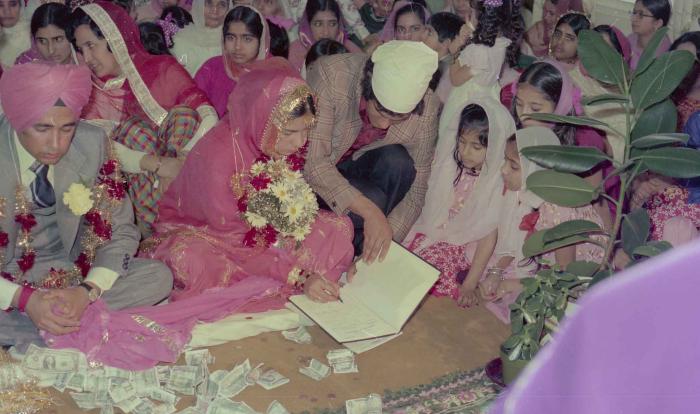 [Photo of Manjit Singh and Sukhdev Gill]