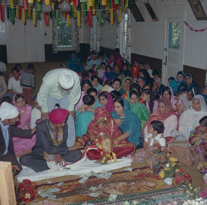 [Photo of Jagdeep Singh Sangha and Sukhdev Kaur Gill]