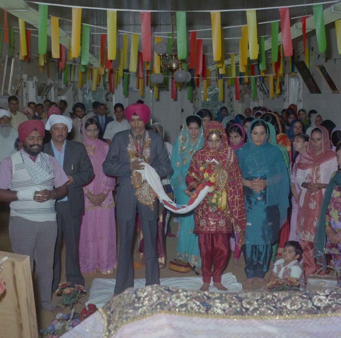 [Photo of Jagdeep Singh Sangha and Sukhdev Kaur Gill]
