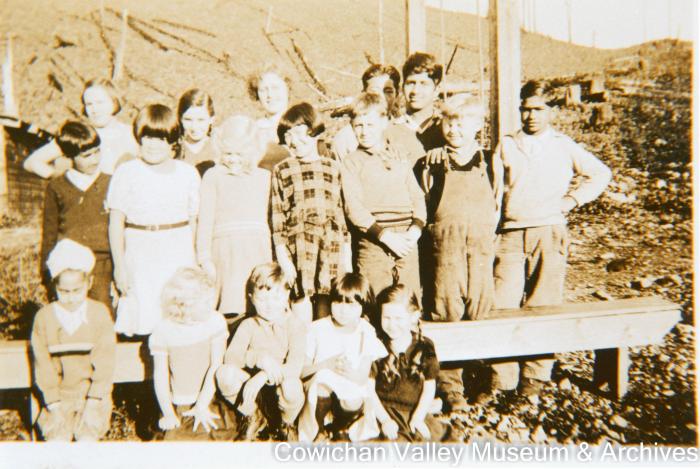 Group of Paldi children playing in logged off area