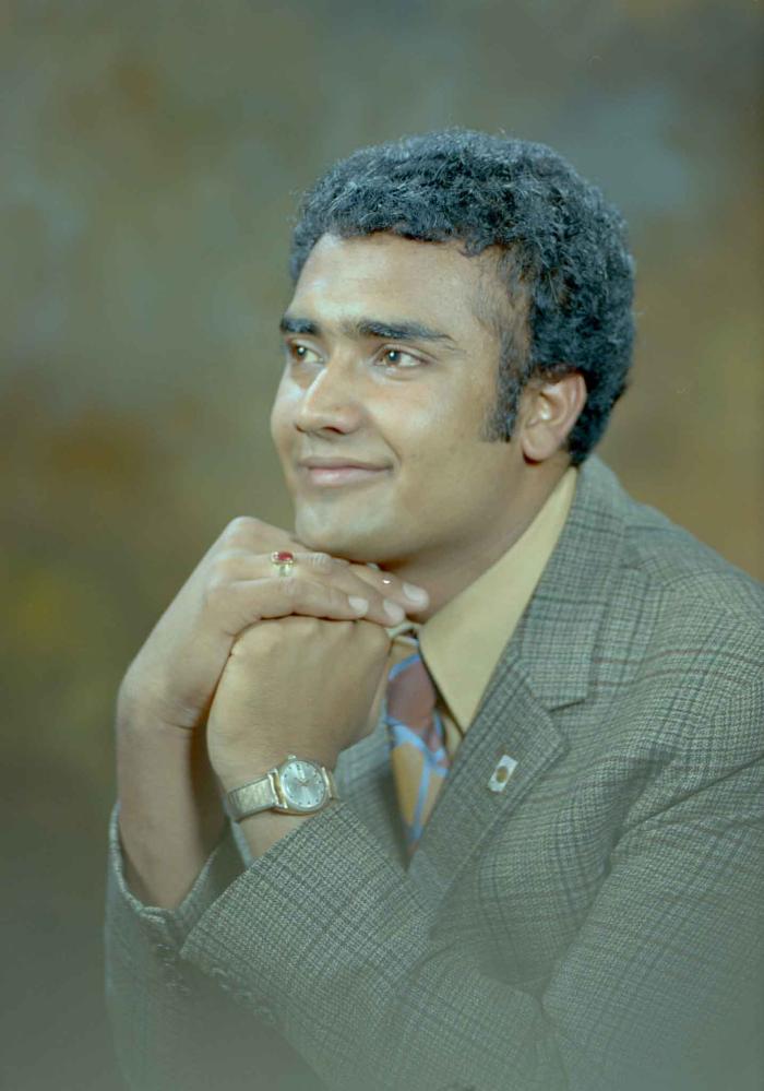 [Portrait of Tejinder Singh Gill]