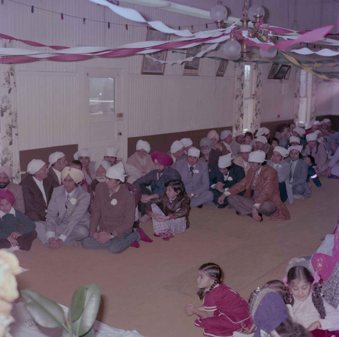 [Group photo of Vern Thind with wedding guests]