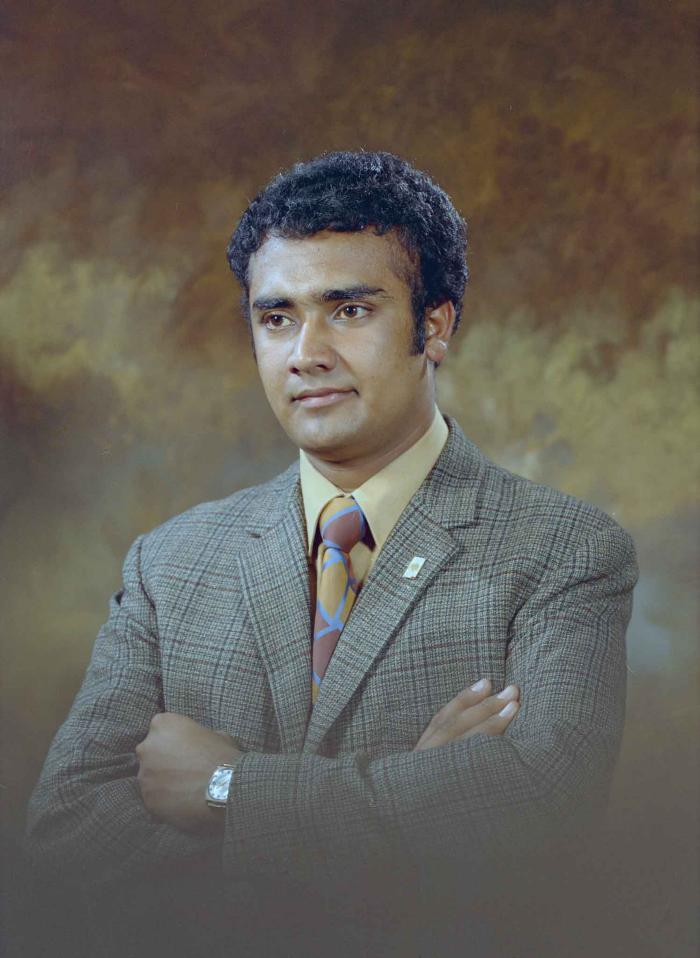 [Portrait of Tejinder Singh Gill]