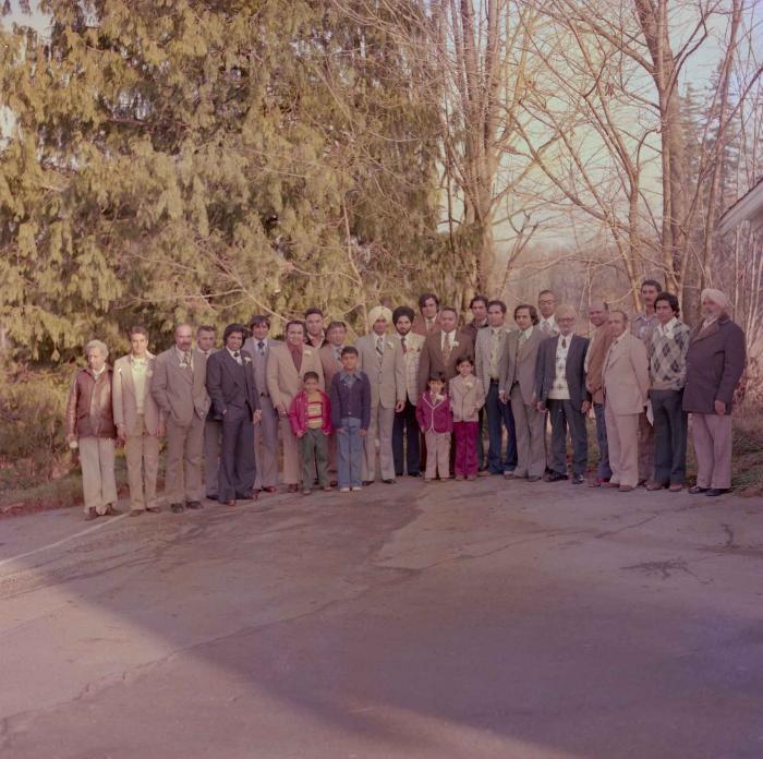 [Group photo of Vern Thind with wedding guests]
