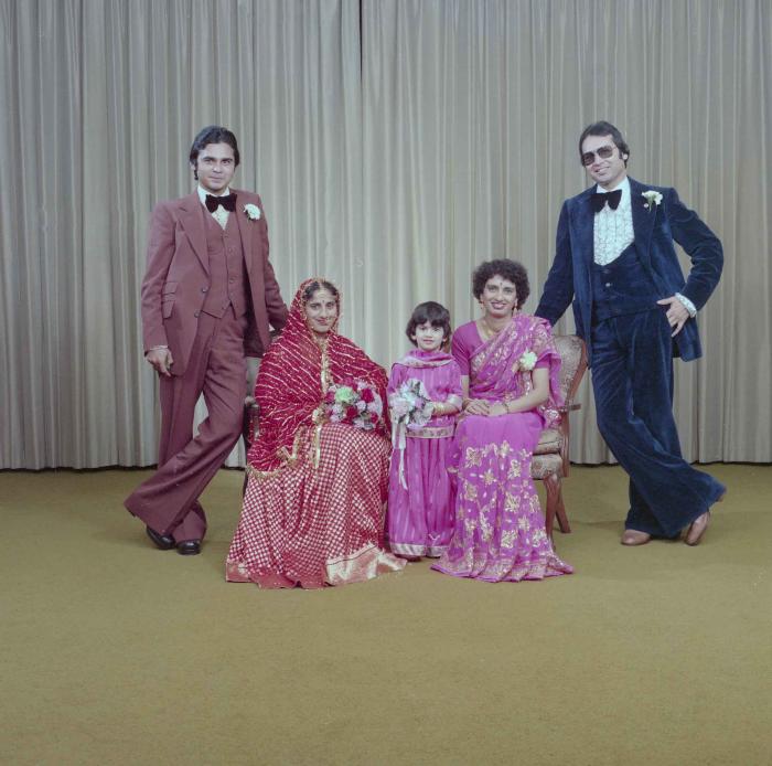 [Group photo of Kataro Gill with wedding guests]