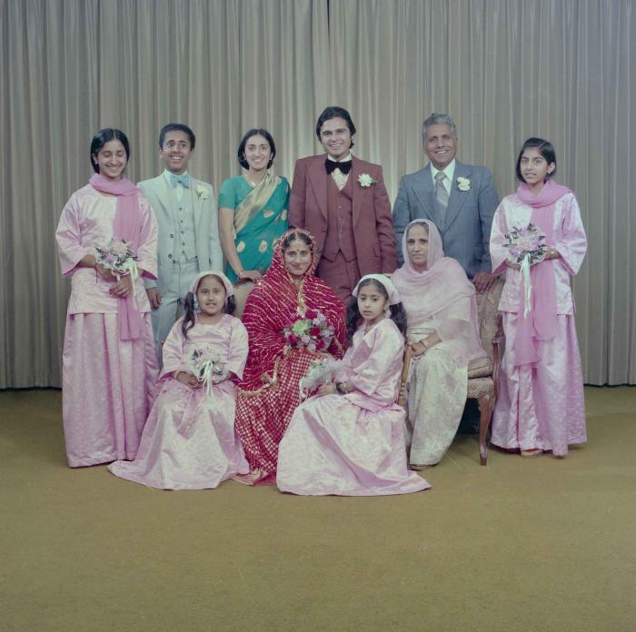 [Group photo of Parminder Tiwana and Kataro Gill with family members]