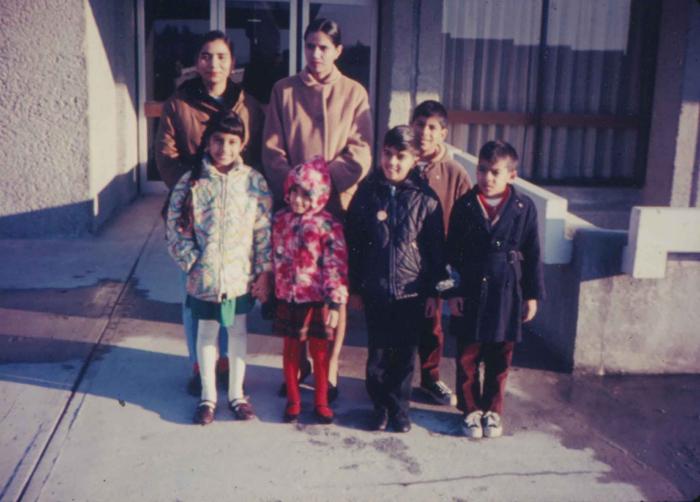 [Photograph of Narinder Kaur Gill, Iqbal Thandi, and children]