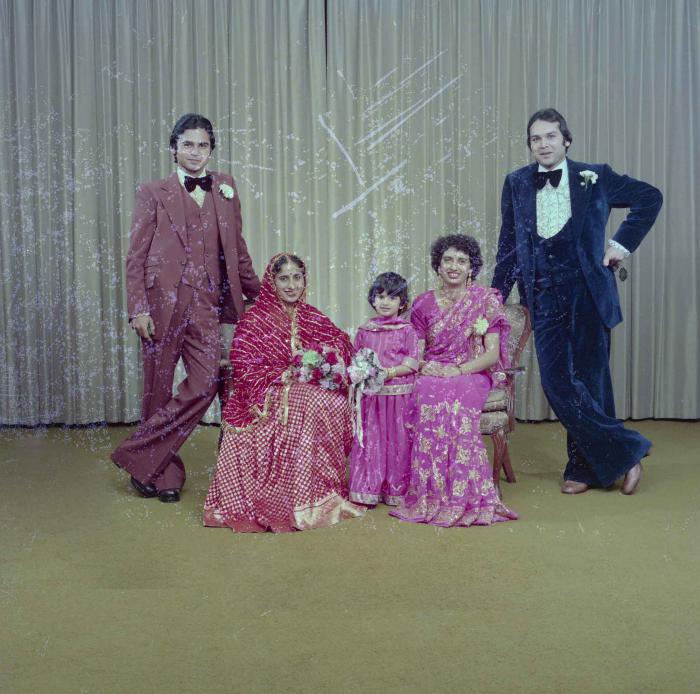 [Group photo of Kataro Gill with wedding guests]