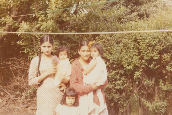 [Photograph of unidentified women and children]