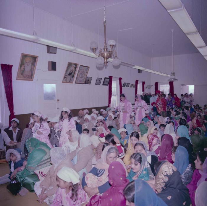 [Group photo of Kataro Gill with wedding guests]