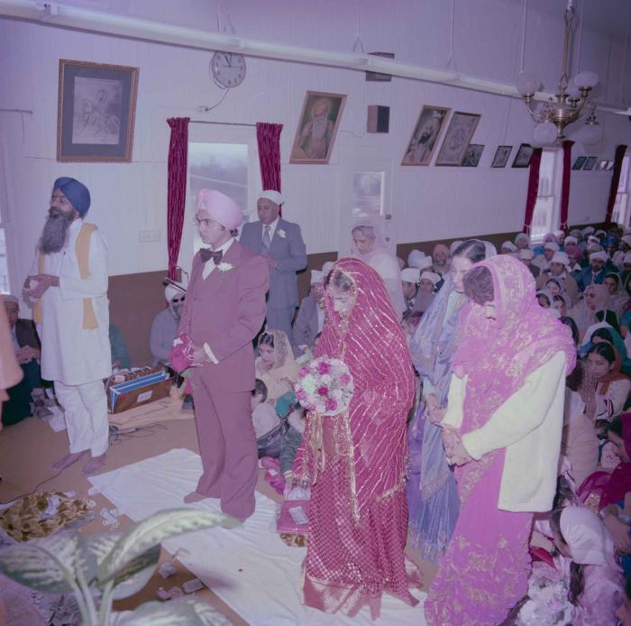 [Group photo of Parminder Tiwana and Kataro Gill with family members]