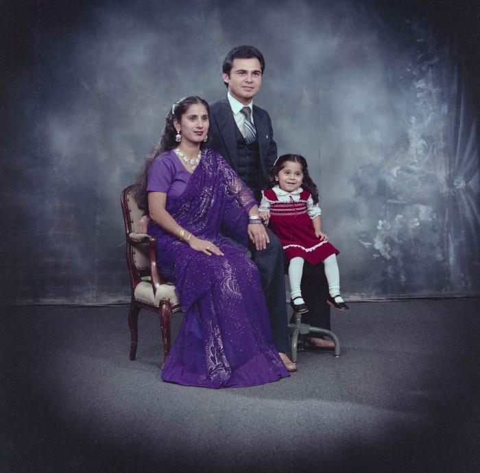 [Portrait of Parminder Tiwana and Kataro Gill with their daughter]