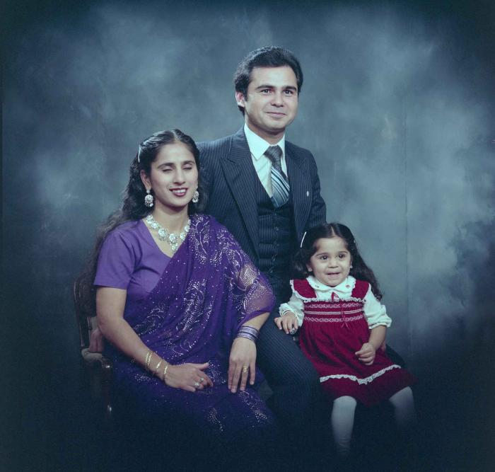 [Portrait of Parminder Tiwana and Kataro Gill with their daughter]