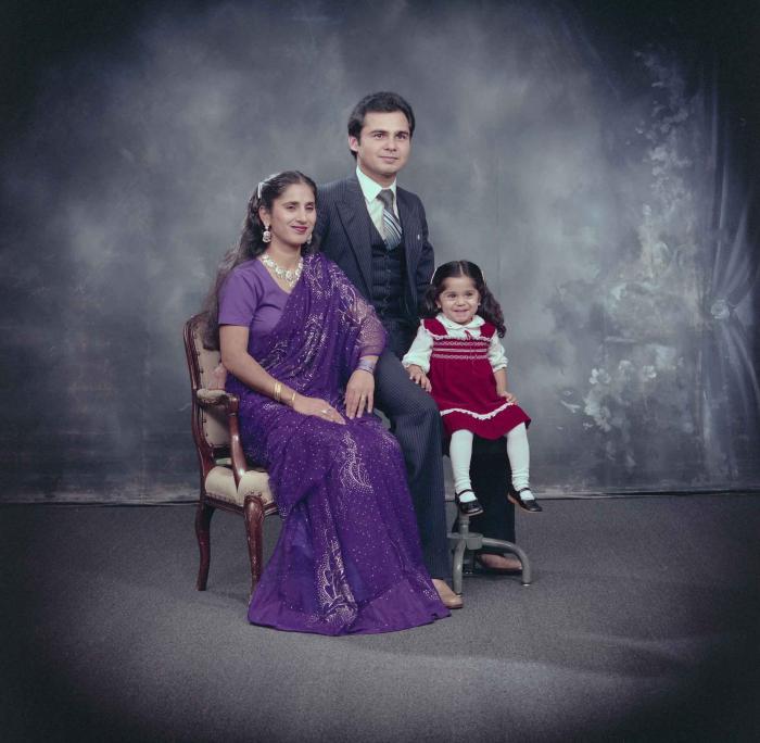 [Portrait of Parminder Tiwana and Kataro Gill with their daughter]