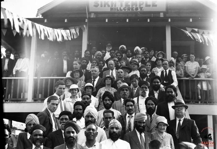 [Group photo of a crowd standing on the front steps of the Hillcrest Gurdwara, Hillcrest, B.C.]