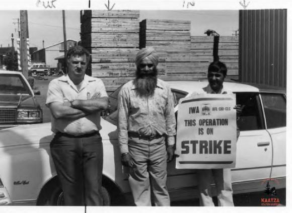 [Group photo of Roger Stanyer, Tarlochan Parhar, and Santokh Dhasi at CIPA Sawmill, B.C. during the 1981 IWA Strike]