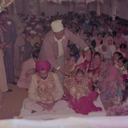 [Photo of Surinder Sidhu, Manjit Sidhu and the wedding guests]