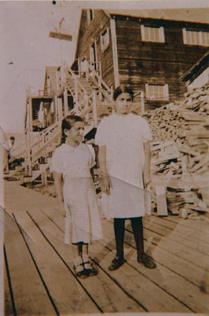 [Photo of Deol Kaur and Mohinder Kaur standing on the boardwalk, Paldi, B.C.]