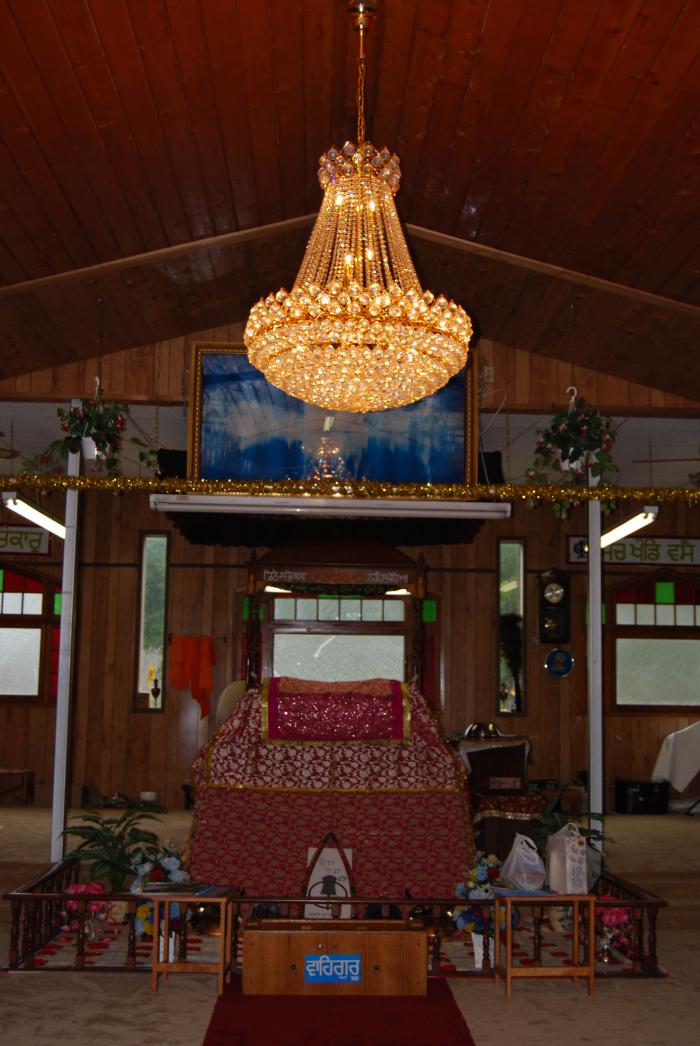 [Photo of Paldi Sikh Temple prayer hall]