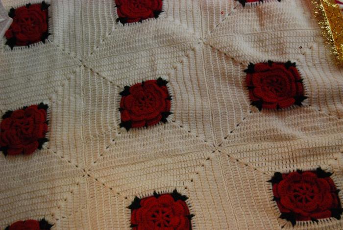 [Photo of crocheted rose print]