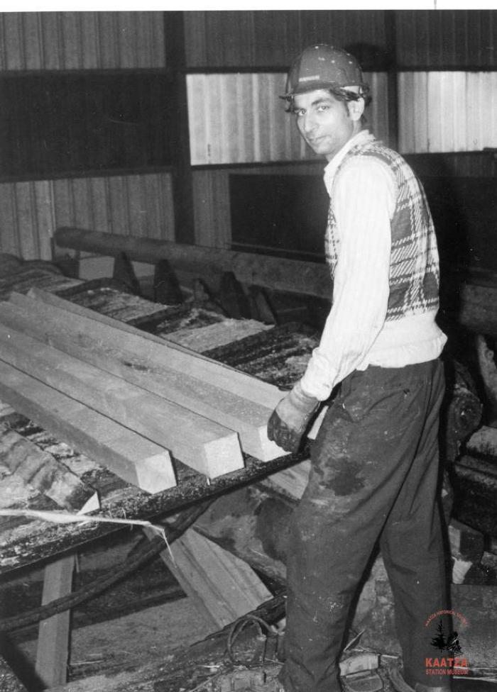 [Portait of dropsorter Boota Rai at the CIPA Sawmill in Nanaimo, B.C.]