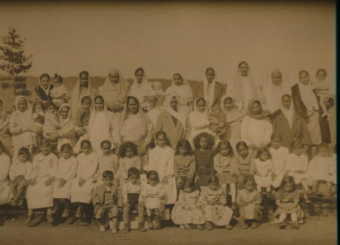 [Group photo of South Asian women and children]