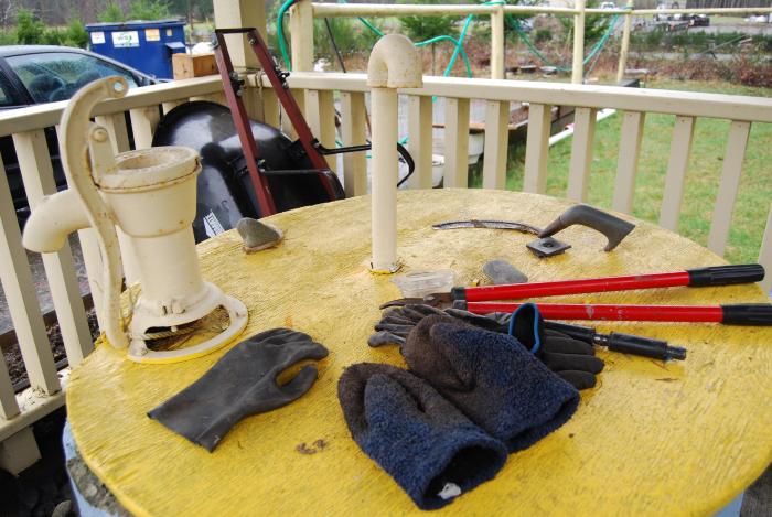 [Photo of tools and gloves]