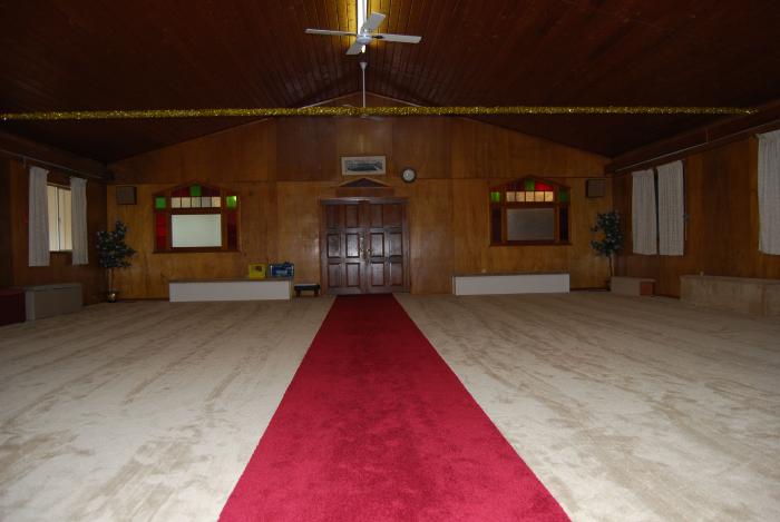 [Photo of prayer hall inside Paldi Sikh Temple, Duncan, B.C.]