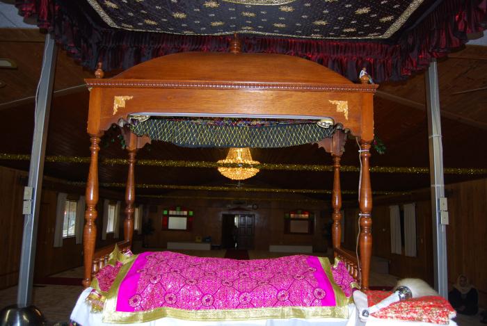 [Photo of dais where the Guru Granth Sahib is placed]