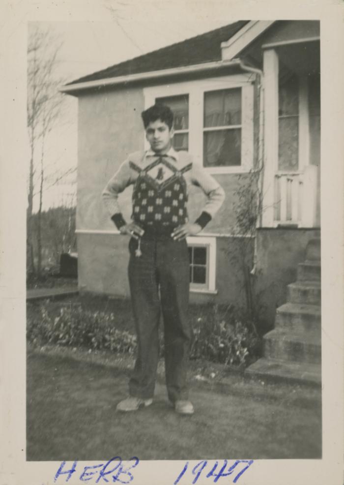 [Photo of young Herb Doman in a front yard]