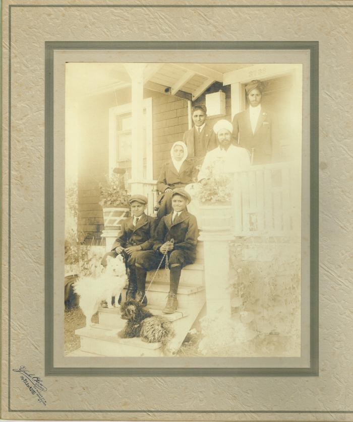 [Group photo of Hundal family in front of their family home in Point Grey, B.C.]