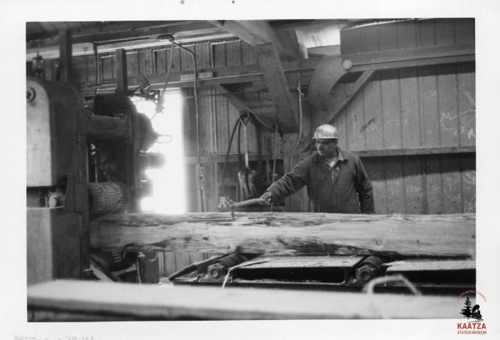 [Photo of tail sawyer Nirmal Manhas at Mayo Lumber in Nanaimo, B.C.]